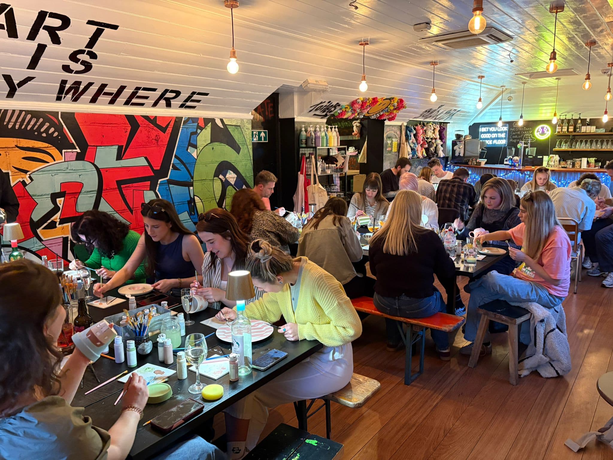 Guests enjoying a private event at art-ful pottery café Worthing