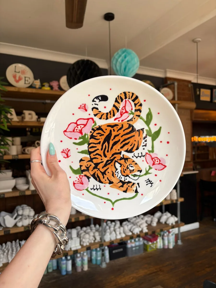Hand-painted tiger dinner plate at art-ful pottery café Worthing