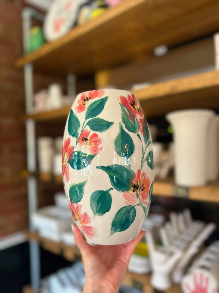 Hand-painted floral vase at art-ful pottery café Worthing
